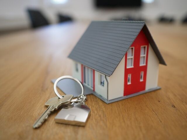 a house with keys next to it